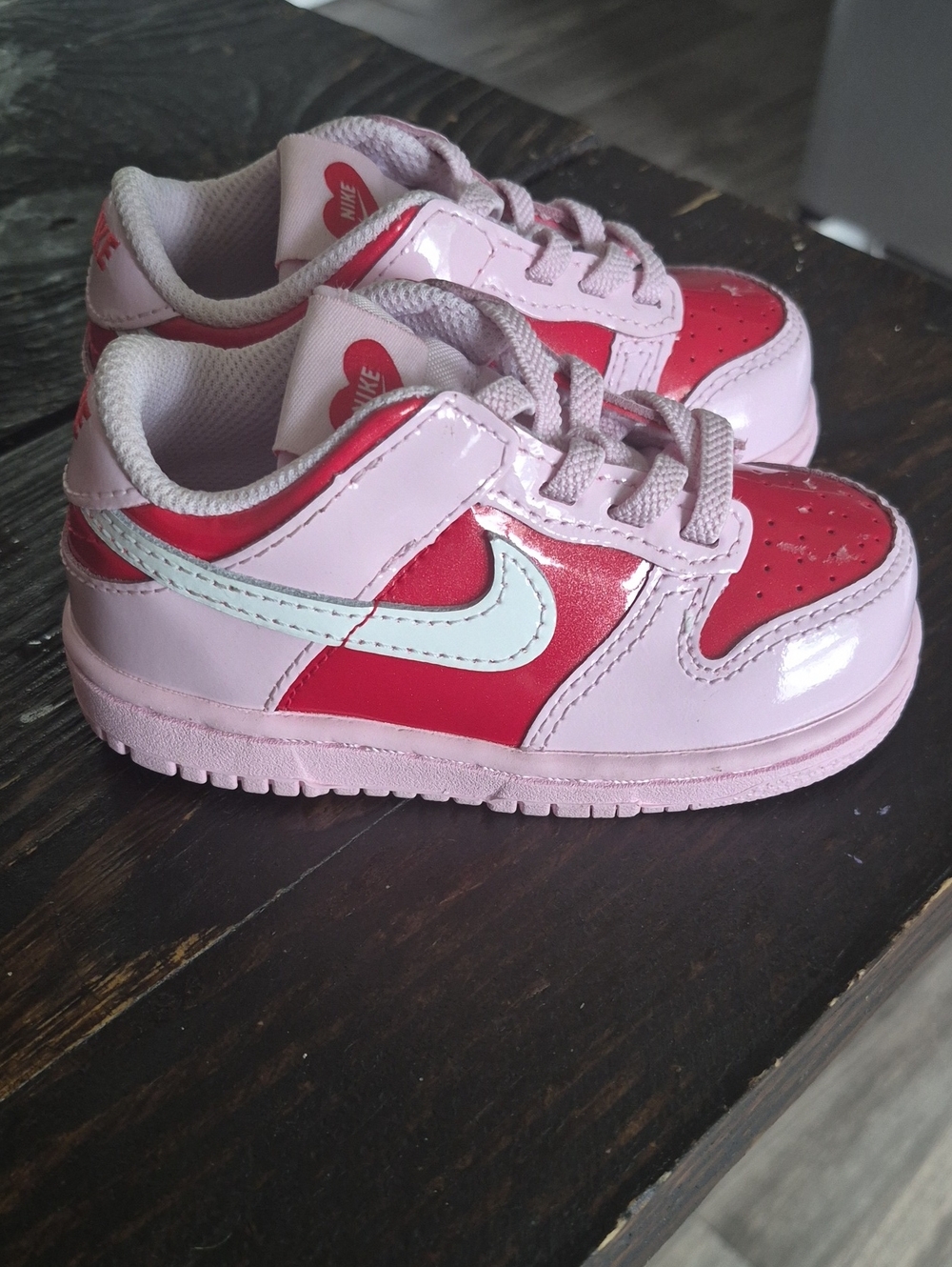 Nike Kids Pink and Red Low-Top Sneakers with White Swoosh